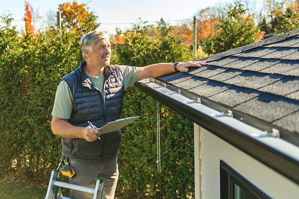 Professional Roofing technician working in Hampton Bays, NY